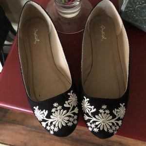 Black embroidered flats